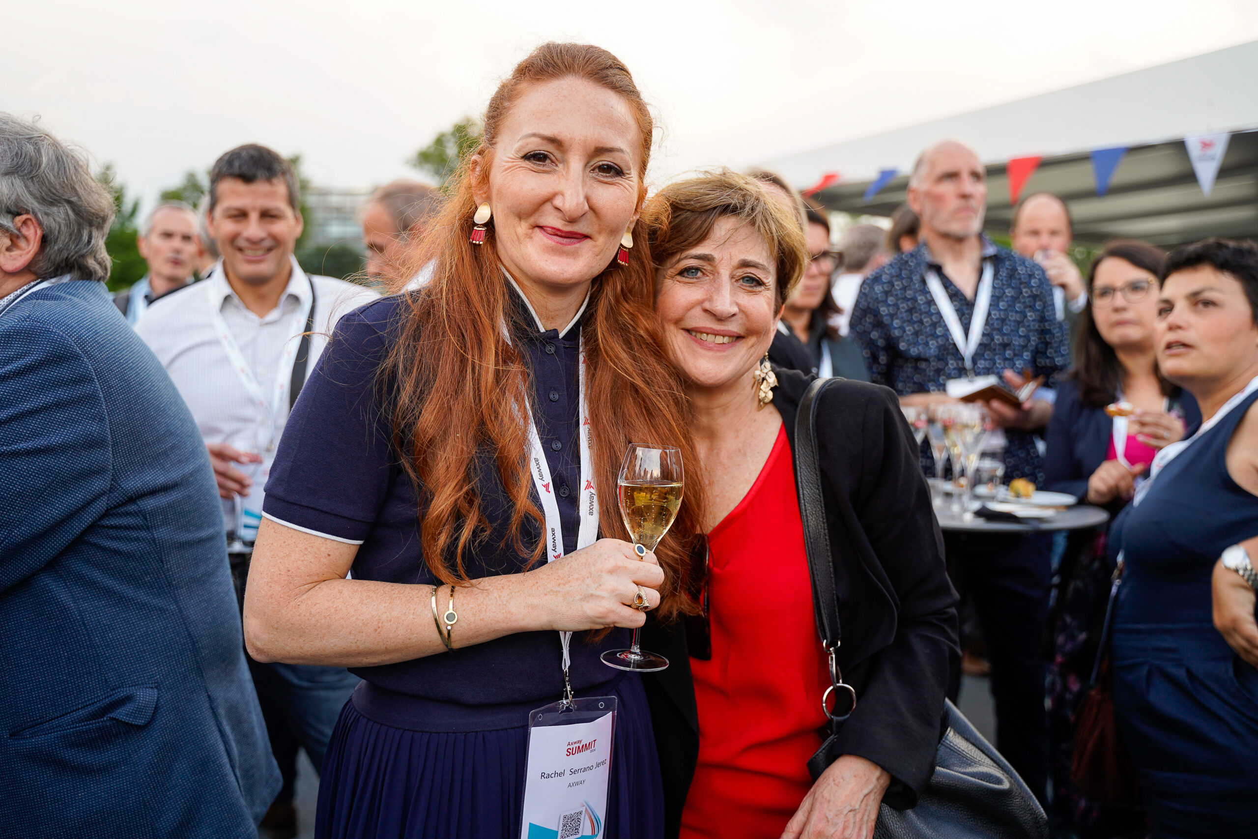 Rachel Serrano Jerez and Sophie Saltiel take a photo at Axway Summit 2024 in Lyon, France