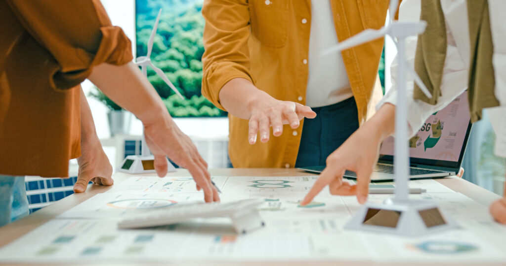Closeup of team members' hands as they're having a meeting