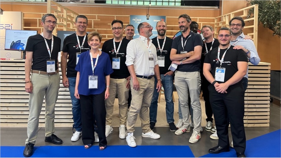 A group of people at the France API conference