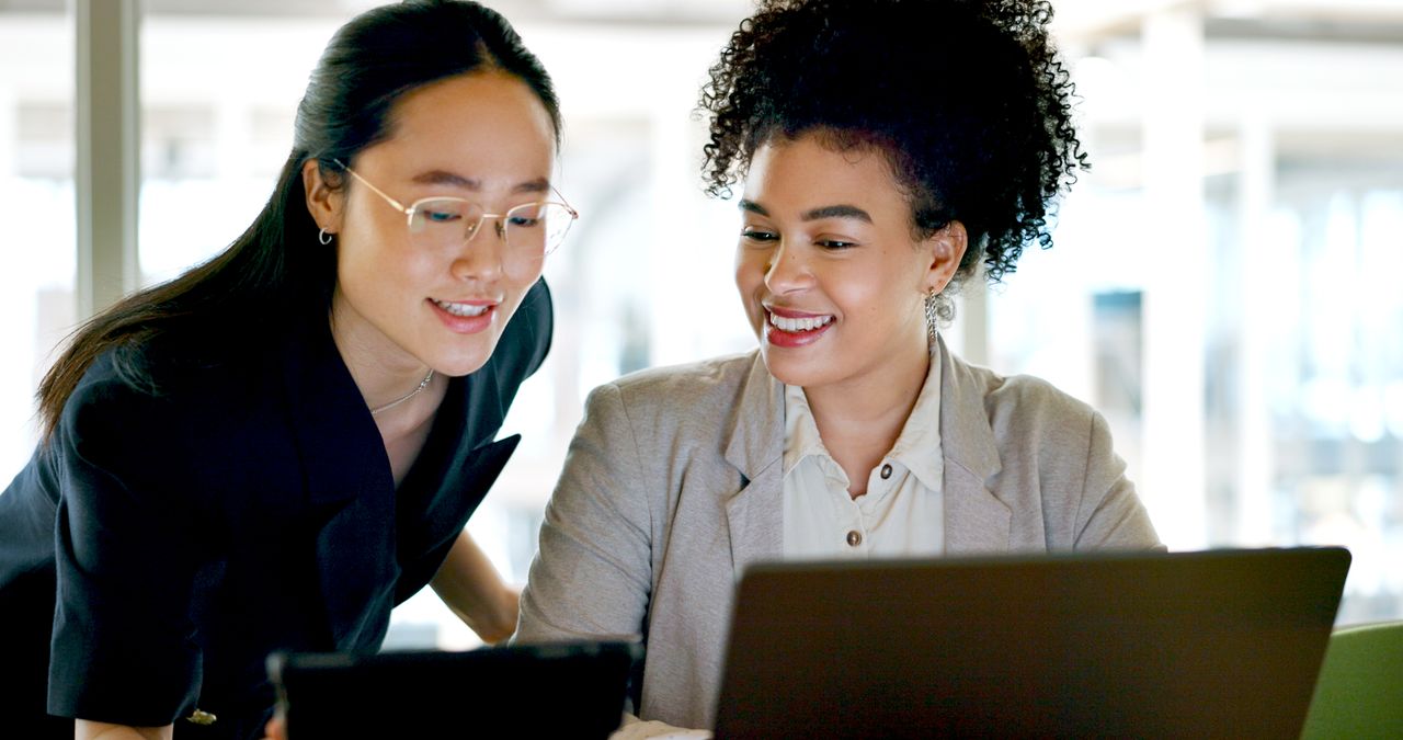 Business, women and talking to employee with tablet, explain process and system update. Asian female, manager and consultant discussion, digital marketing and online planning for campaign schedule