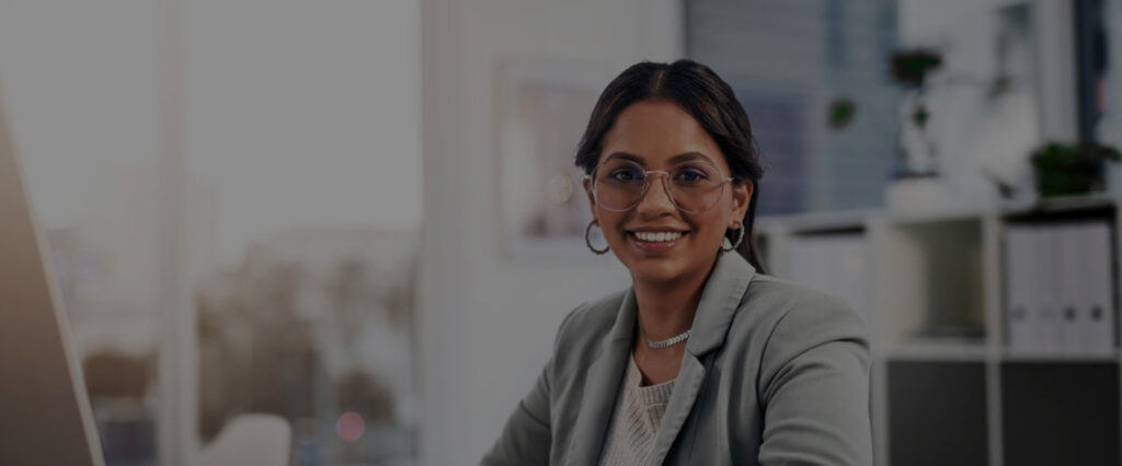 Woman wearing glasses and smiling