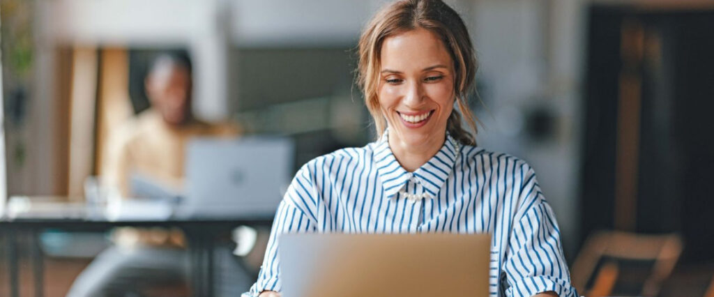 woman typing on a computer